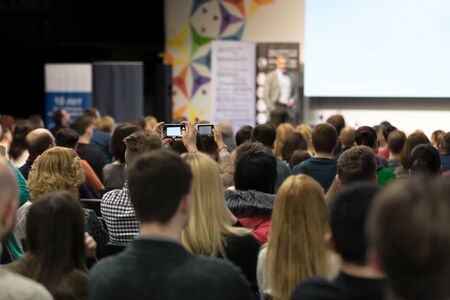 Chisinau, Republic of Moldova - March 11, 2018: speaker at Business Conference and Presentation. Audience at the conference hall. Horizontally framed shot.のeditorial素材