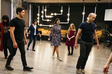 Chisinau, Republic of Moldova - April 30, 2018: People move around the audience in different directions. Lesson in acting. Horizontally framed shot.のeditorial素材