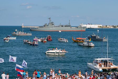 Sevastopol, Ukraine - July 31, 2011: The military ship General Ryabikov in the sea. Day of the Navy. Horizontally framed shot.のeditorial素材