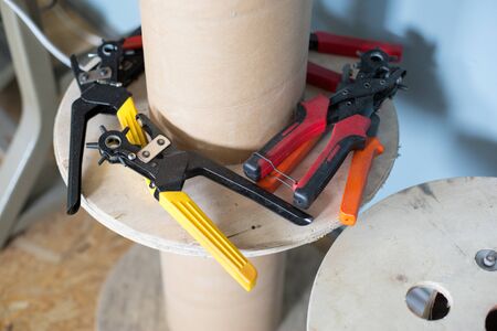 Tools for working with leather products. Horizontally framed shot.の写真素材