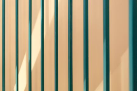 Forged green handrail of the spiral staircase. Horizontally framed shot.の写真素材