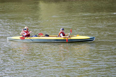 Chisinau, Republic of Moldova - October 04, 2020: Kayakers swim along the river. Horizontally framed shot.のeditorial素材
