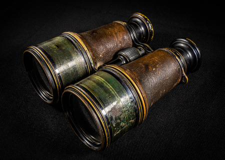 A pair of antique copper and brass binoculars.の写真素材