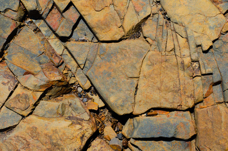 Cracks and fissures in an exposed shale outcrop create beautiful and richly textured images.の写真素材