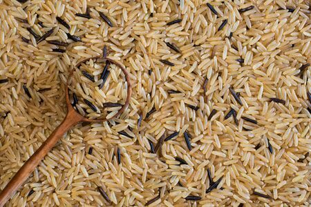Brown and wild rice is considered to be high in fibre and a healthier alternative to regular commercial white rice.の写真素材
