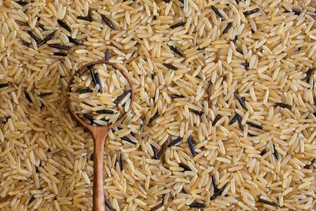 Brown and wild rice is considered to be high in fibre and a healthier alternative to regular commercial white rice.の写真素材