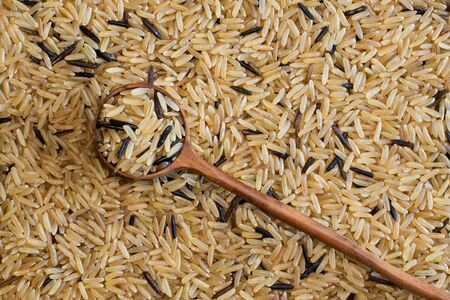 Brown and wild rice is considered to be high in fibre and a healthier alternative to regular commercial white rice.の写真素材