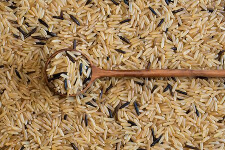 Brown and wild rice is considered to be high in fibre and a healthier alternative to regular commercial white rice.の写真素材
