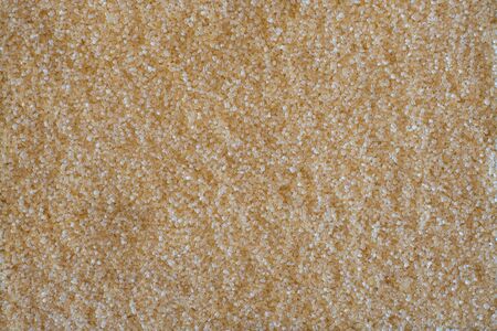 Brown sugar, considered my many to be a healthier alternative to white sugar, gets it rich dark golden colour from molasses.の写真素材