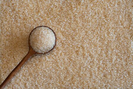 Brown sugar, considered my many to be a healthier alternative to white sugar, gets it rich dark golden colour from molasses.の写真素材