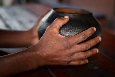 African beer, referred to as utshwala in Zulu, is brewed from mealie meal and drunk out of a clay drinking vessel called an ukhamba.の写真素材