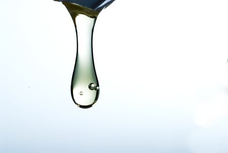 Drop of liquid pouring down