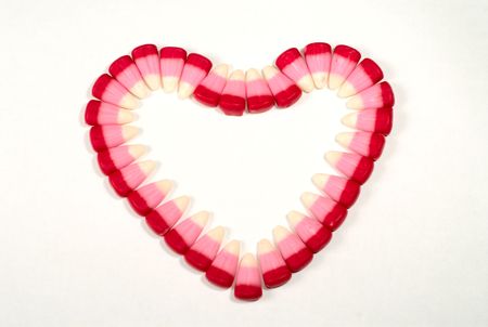 Candy corn in heart shape for valentinesの写真素材