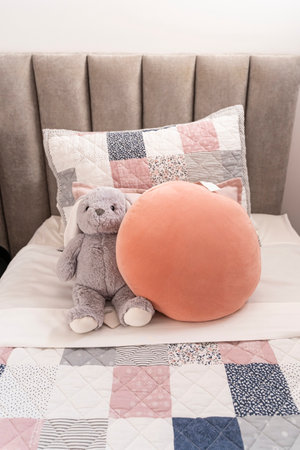 Interior nursery design, stuffed animals, gray rabbit and ball, kids bedroom, residence decoration,...