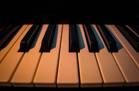 contrasted piano in black background