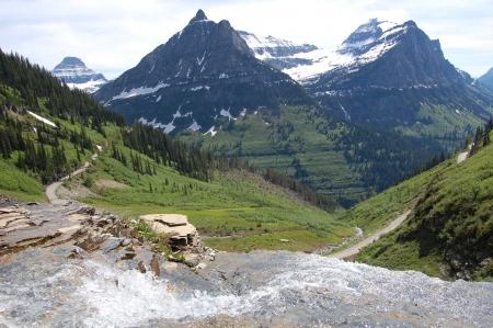 Waterfall over Logan s Pass in Glacier National Parkの写真素材