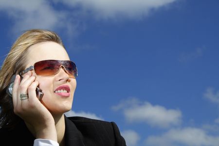 woman calling outdoorsの写真素材