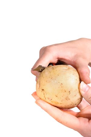 peeling potatoesの写真素材