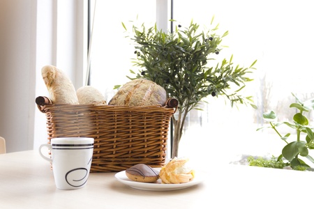 Bread, pastry and coffee cupの写真素材