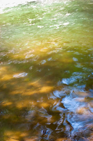 Wind blows on the surface of river waterの写真素材