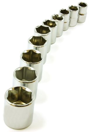Curve of sockets from ratchet set, isolated on white
