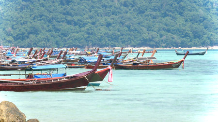 LIPE Island, Satun - November-9-2020 : Traditional wooden long tail boats on beach, LIPE Island, Satun, Thailandのeditorial素材