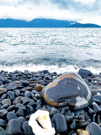 Beautiful multicoloured stones at Ko Hin Ngam island, Tarutao National Park in the Andaman Sea, Satun, Thailand.の写真素材