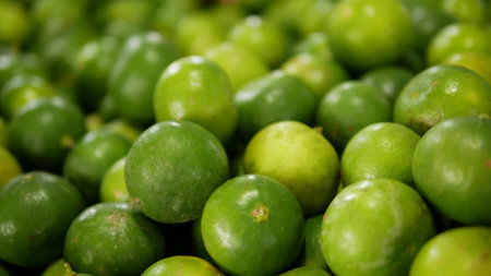 Background from fresh lime, blurry lime in market, Nature foodの写真素材