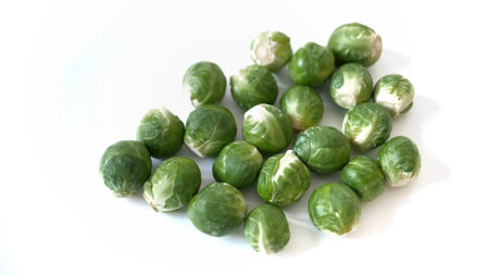 Heap of Brussel Sprouts isolated on white backgroundの写真素材