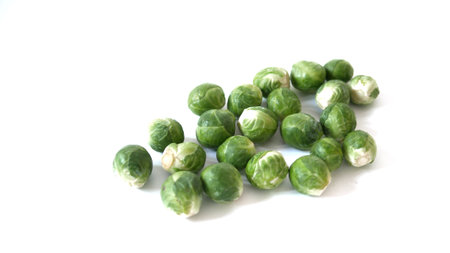 Heap of Brussel Sprouts isolated on white backgroundの写真素材