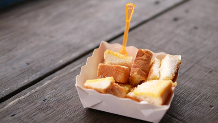 Grill toast with butter and sugar in take away container, Thai t
raditional dessertの写真素材