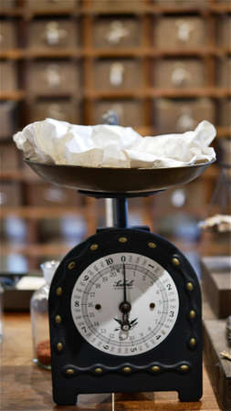 January 7 2021 - Bangkok, Thailand : Old weight scale in vintage Pharmacyのeditorial素材