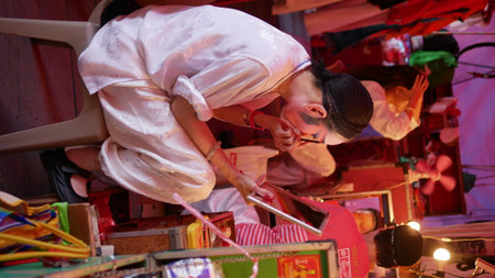 February 15 2021 : Bangkok, Thailand :  An ancient drama in musical way, Chinese opera performer in makeup  at backstage at Lhong 1919, Bangkok, Thailandのeditorial素材