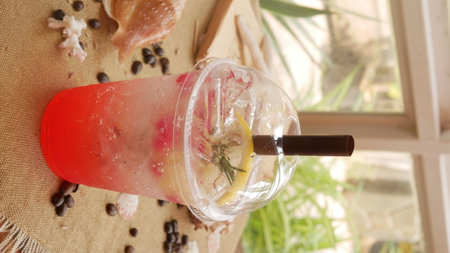 Strawberry soda in plastic cup with straw, sweet and cold drink concept.の写真素材
