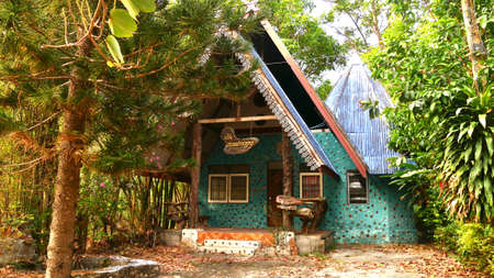 March 18 2021 - Ratchaburi, Thailand : Front of rural house surrounded by trees in countryside, Suanphueng, Ratchaburi, Thailand.のeditorial素材