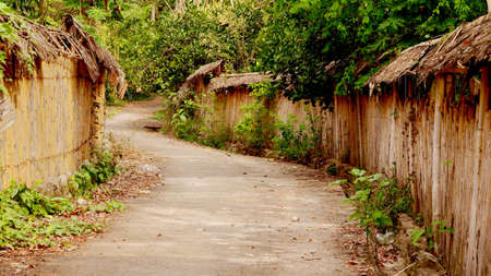 Beautiful bamboo fence along the corridor in countryside village.の写真素材