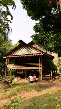 March 18 2021 - Ratchaburi, Thailand : Front of  rural house surrounded by trees in countryside, Suanphueng, Ratchaburi, Thailand.のeditorial素材