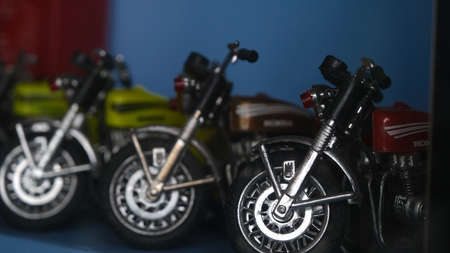 June 3 2021, Nonthaburi, Thailand : Depth of field of row of antique Motorcycle model, Retro bike model Chomchei Cafe The Memory Gallery, retro bike model in the museum, toy collection.のeditorial素材