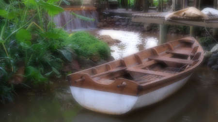 Soft focus wooden boat in the river,  blurry, foggy landscape.の写真素材