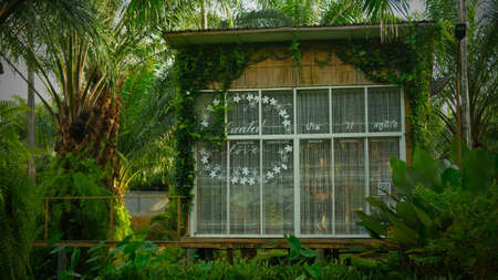 Little wooden house in the garden, wooden house in the wood.の写真素材