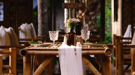 Countryside private dinning room  with beautiful decorative on the wooden table.