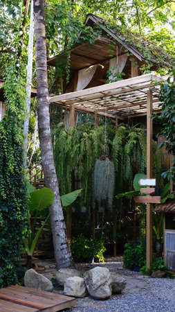 Wooden two story house in nature.の写真素材