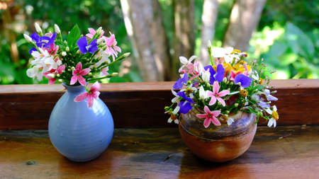 Bouquet of colorful flowers arranged in small vase, selective focus.の写真素材