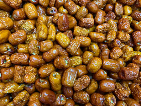 Dried jujube or monkey apple in market, tradition Chinese medicine.の写真素材