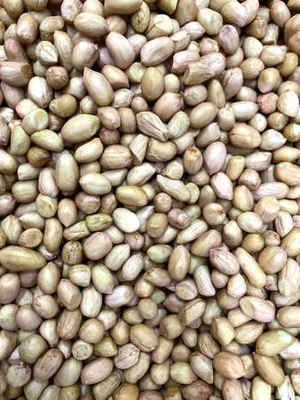 Peeled peanuts as a background and texture.