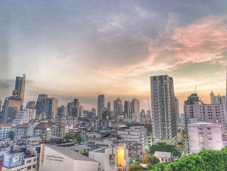 December-3- 2021 :  Bangkok, Thailand, Cityscape of high rise building in Bangkok, panorama of Modern buildings and high towers in the evening.のeditorial素材