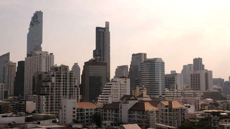 December-3- 2021 :  Bangkok, Thailand, Cityscape of high rise building in Bangkok, panorama of Modern buildings and high towers in the evening.のeditorial素材