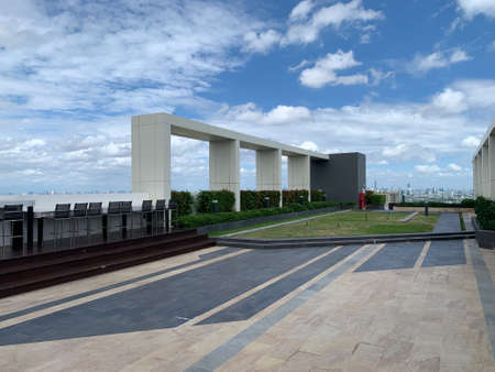 February-20-2022 Resting area at the rooftop terrace with cityscape view from Prodigy Condominium,...