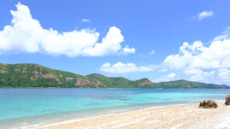 Beautiful tropical beach with white sand and clear water at Kho Kham Island, Chonburi Province, Thailand.の写真素材
