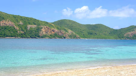 Beautiful tropical beach with white sand and clear water at Kho Kham Island, Chonburi Province, Thailand.の写真素材